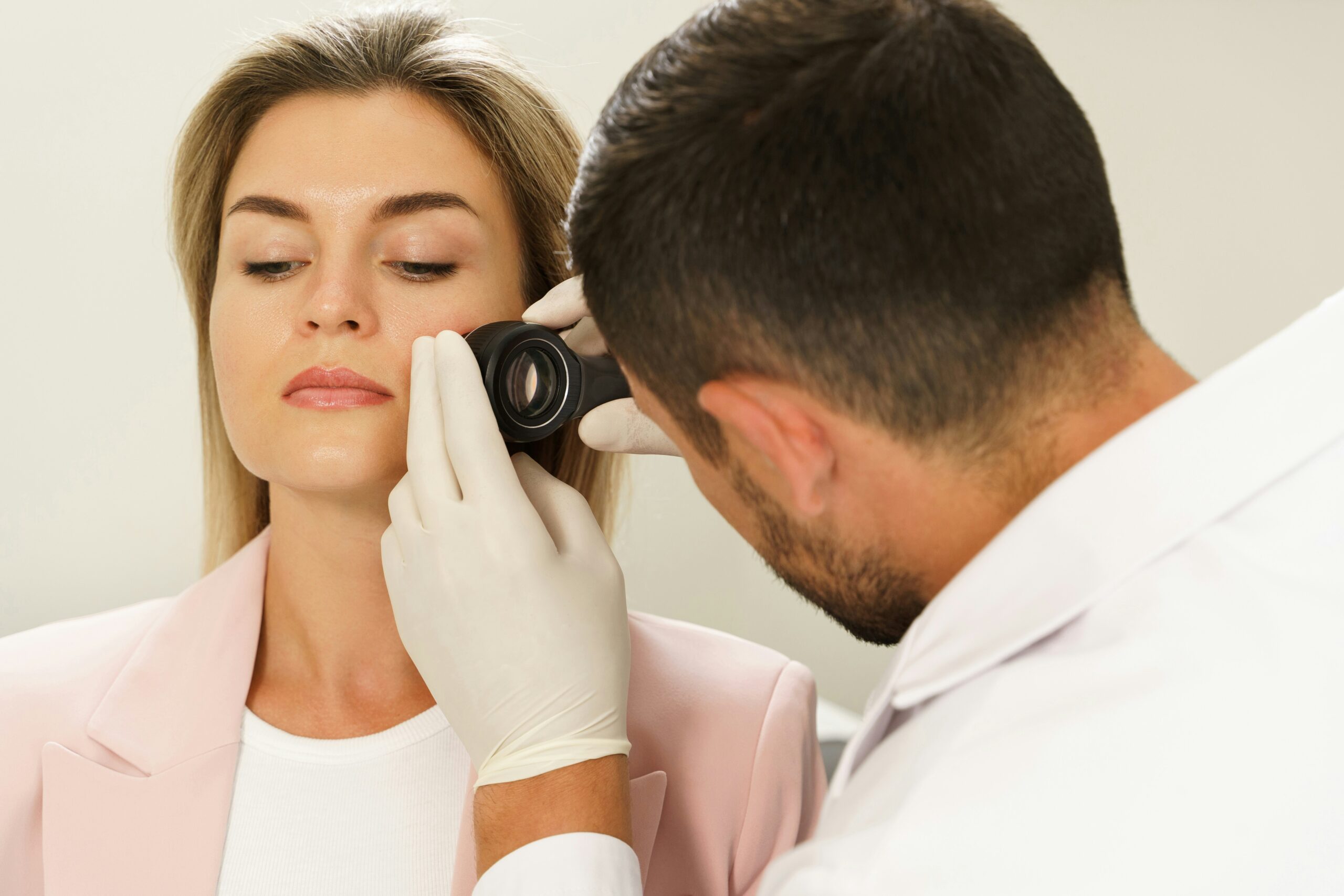 Skin cancer dermatologist in Nashville performing a full-body skin cancer screening
